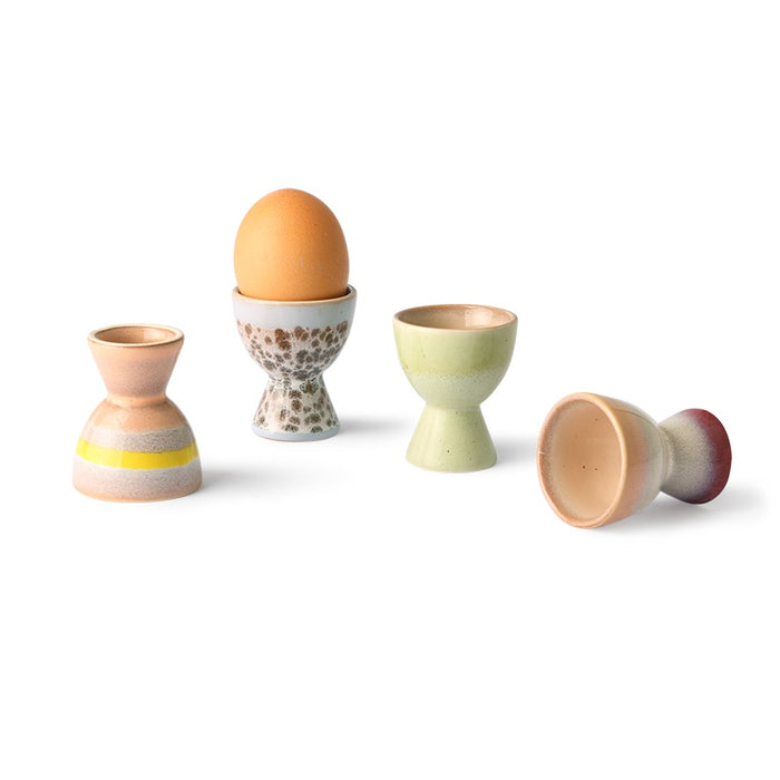 4 egg cups with different finish and color