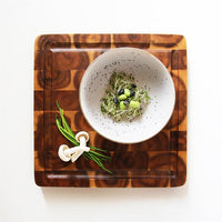 still life of ceramic egg bowl and tray