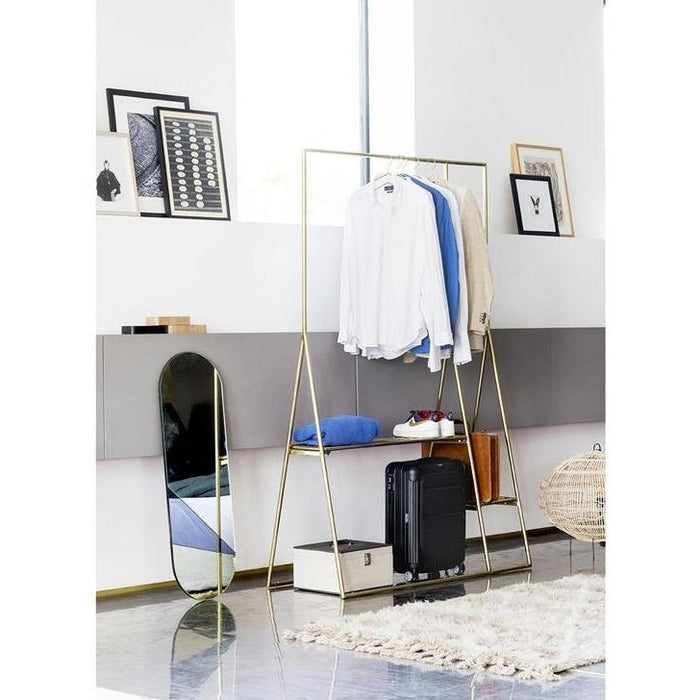clothing rack with brass clothing hangers