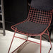 Detail of metal wire chair in marsala with comfort kit in charcoal