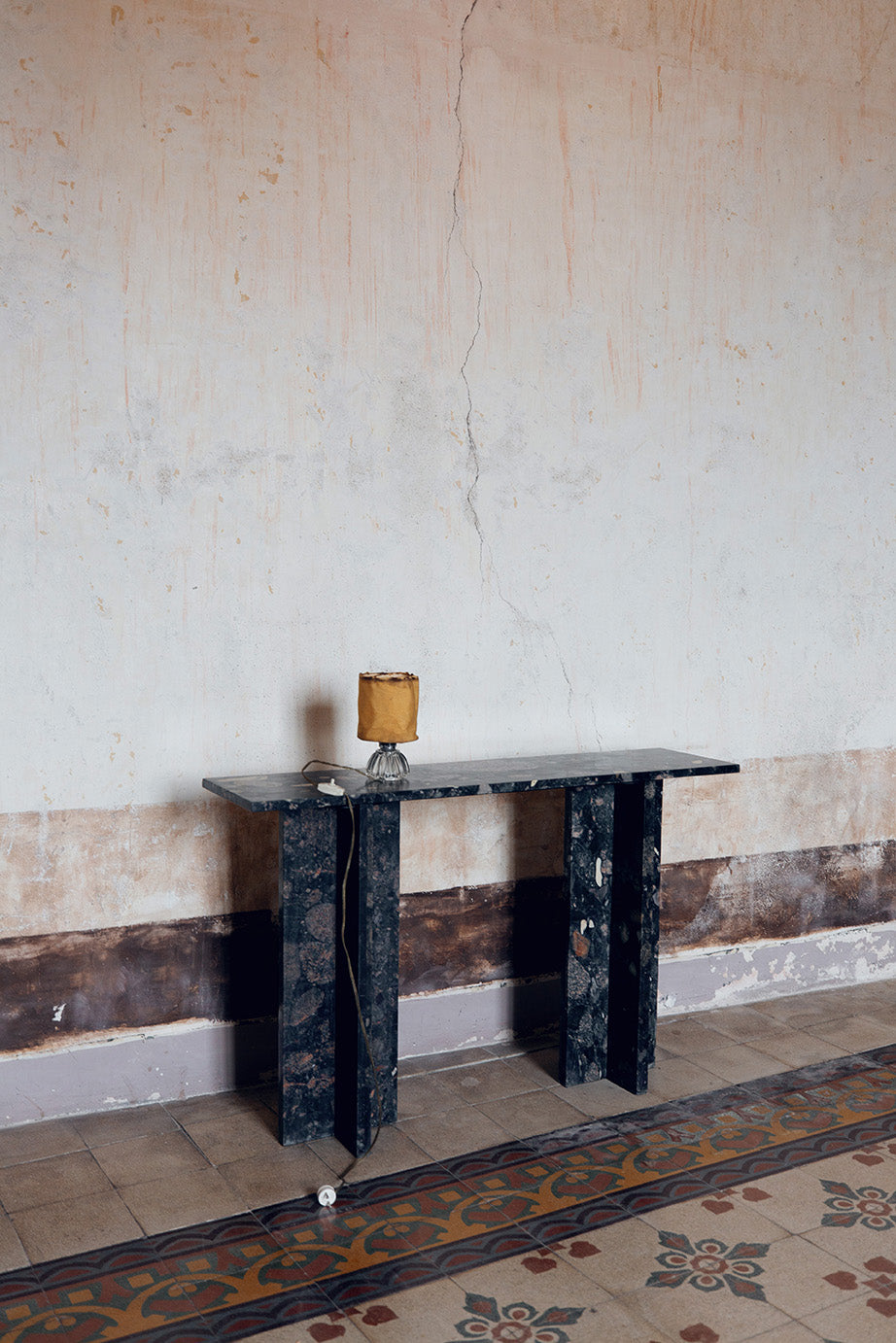 hallway palazzo  dark toned natural marble console table