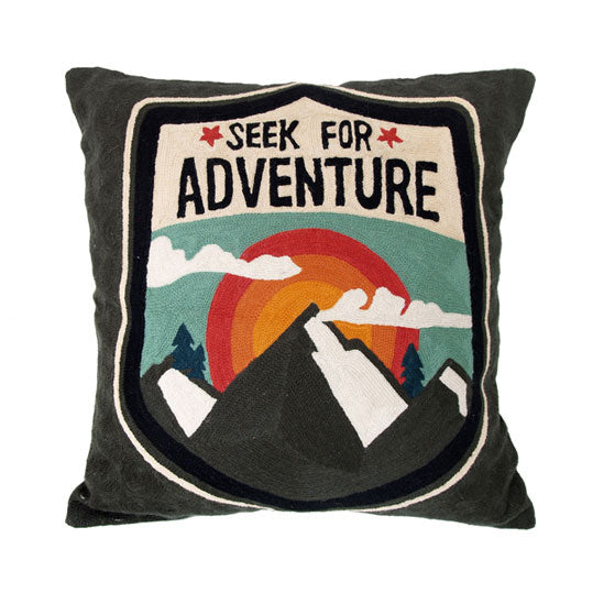 hand embroidered cushion with seek for adventure text and mountain 