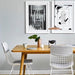 White metal dining chair with grey comfort kit and art works