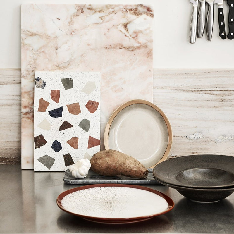 kitchen with marble backsplash and side plate earth