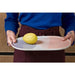 oval shaped plate with lemon