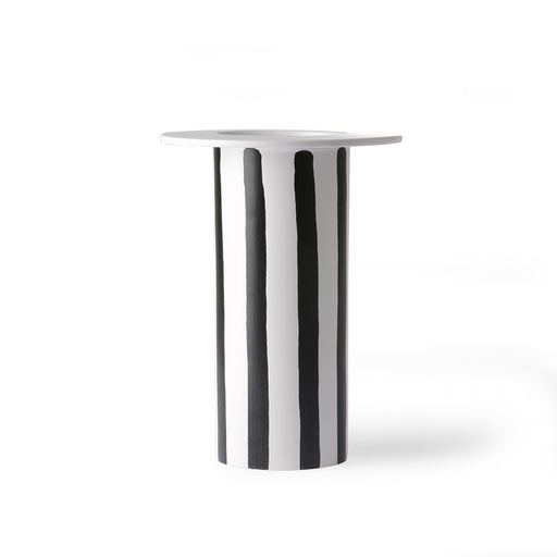 white ceramic vase with black diagonal stripes