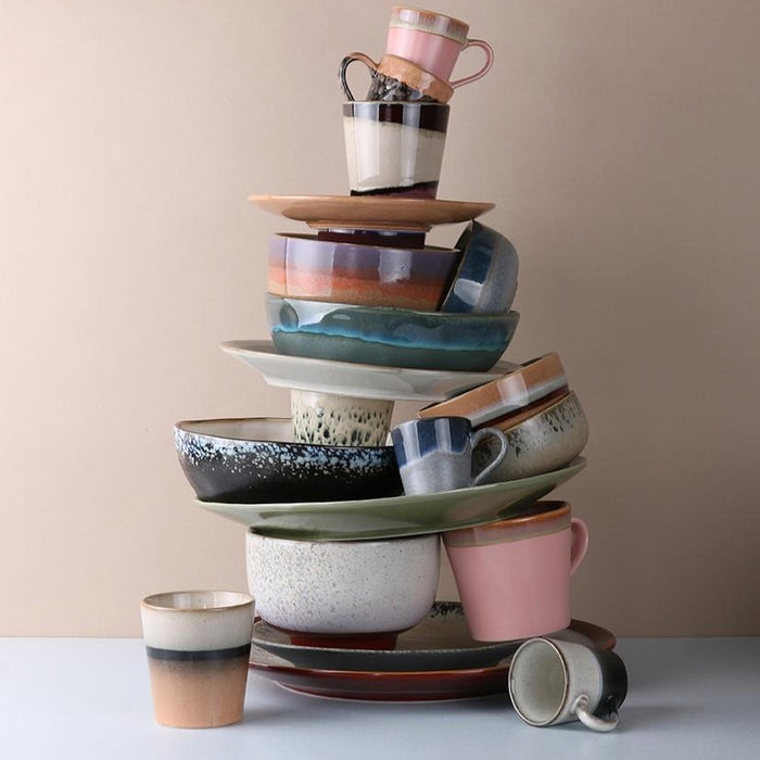 stack of new 2020 collection ceramic plates, bowls and mugs