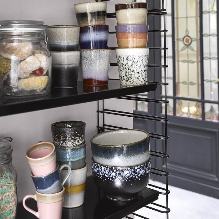 open shelf unit in black with pastel colored hk living usa ceramic bowls and mugs