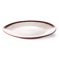 organic shaped ceramic dinner plate in white and brown tones