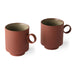 two ceramic mugs with ear in terracotta color