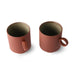 two stoneware mugs with ears in terracotta color