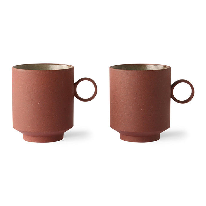 two Scandinavian style coffee mugs with ear in matte terracotta color
