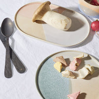 table setting in pastel colored ceramics
