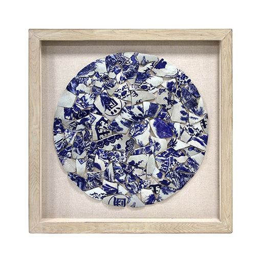 framed shattered blue and white porcelain in a circle with wooden frame