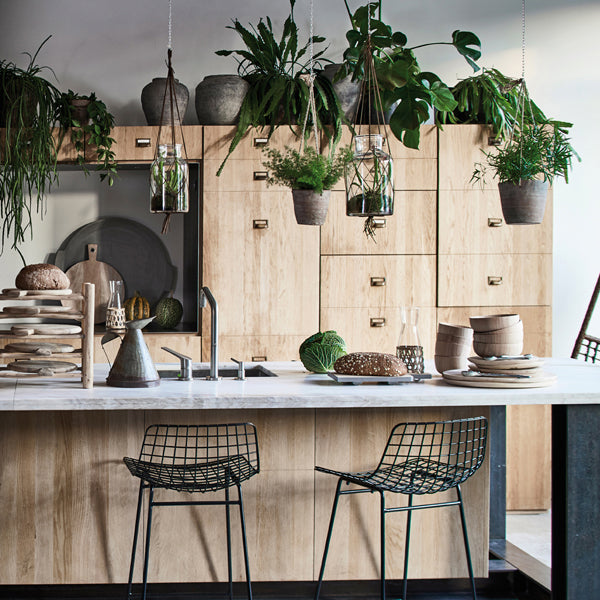 counter with hanging garden and hanging vases
