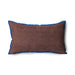 brown linen lumbar pillow with blue cotton trim