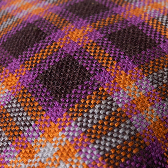 detail of retro style purple and orange cotton pillow