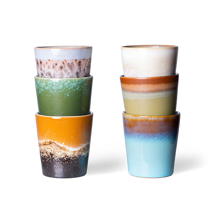 two stacks of 3 stoneware coffee cups in retro style and colors