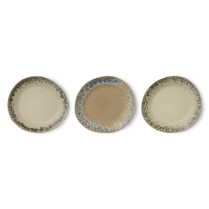 3 variations of finish of a side plate made from stoneware with a reactive glaze