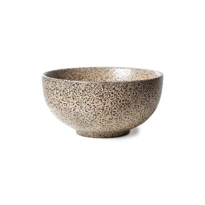 stoneware bowl in taupe color with dark speckles