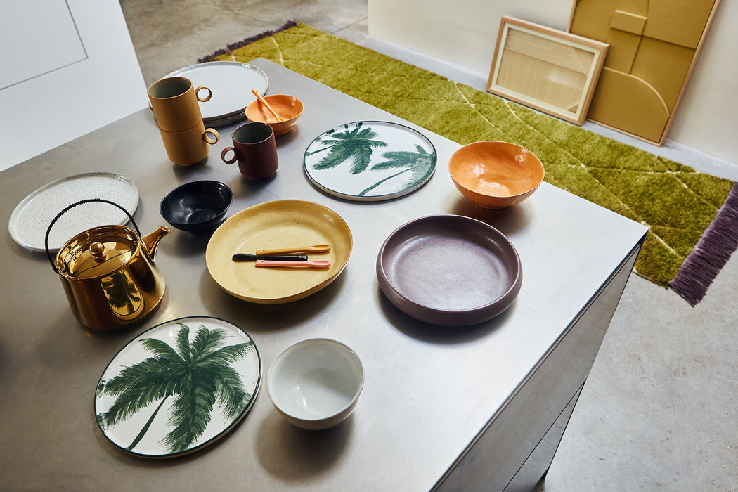 table with different plates bowls and spoons from the HKliving Bold & Basic collection