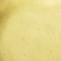 detail of a deep porcelain plate yellow and brown color