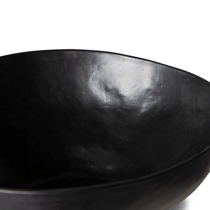 detail of a organic shaped black porcelain bowl