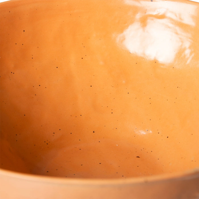 detail of porcelain organic shaped orange bowl
