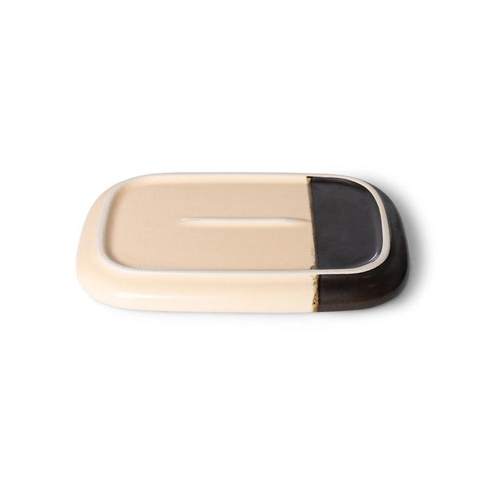 cream and black color bottom of a small stoneware tray