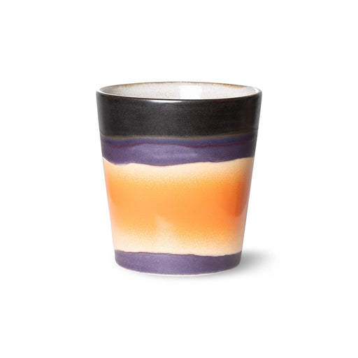 cream white, black, brown orange and lavender colored small stoneware coffee cup in retro style