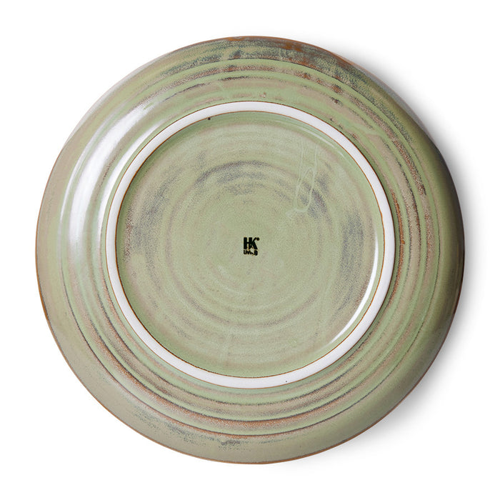back side of a handmade, moss green ceramic deep plate