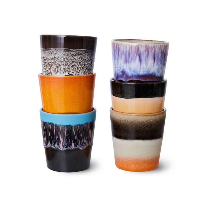 two stacks of 3 coffee mug tumblers in various colors