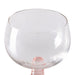 low stem wine glass with a pink foot