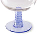 detail of blue colored low stem of the retro style wine glass