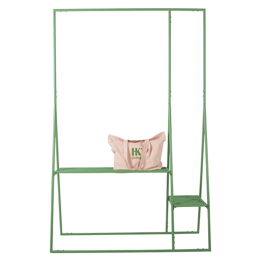 green metal open wardrobe clothing rack with pink linen tote with HKliving USA logo