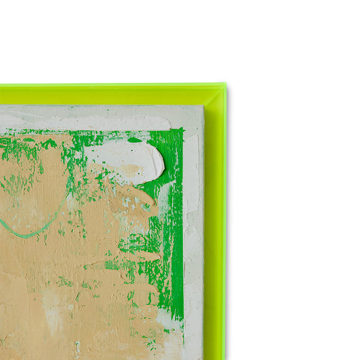 detail of large abstract painting with neon yellow frame
