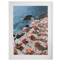 framed photo of orange parasols at Amalfi Coast