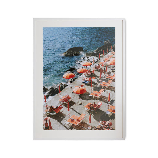 framed picture of orange parasols on the coast of Amalfi