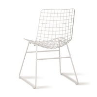 back of a white metal chair