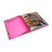 two pages of an open hardcover pink coffee table book