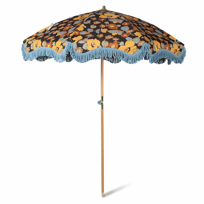 retro style parasol with flower fabric and blue fringes