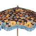 retro style parasol with flower fabric and blue fringes