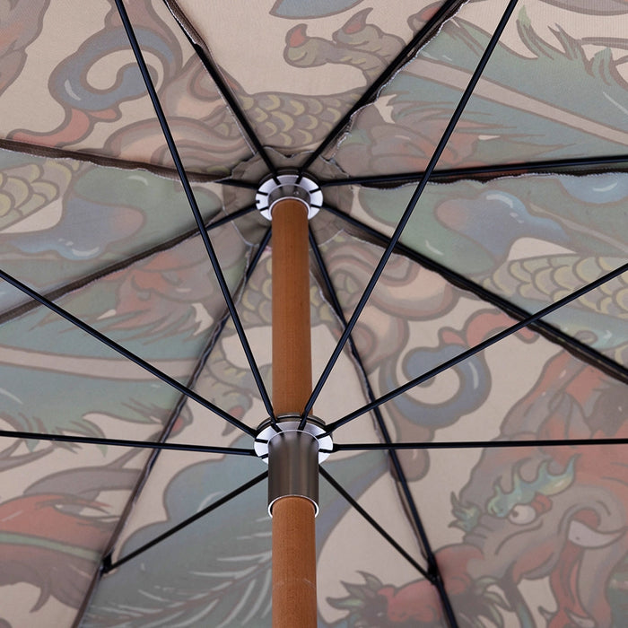 inside of retro style beach parasol dragons and ombre fringes