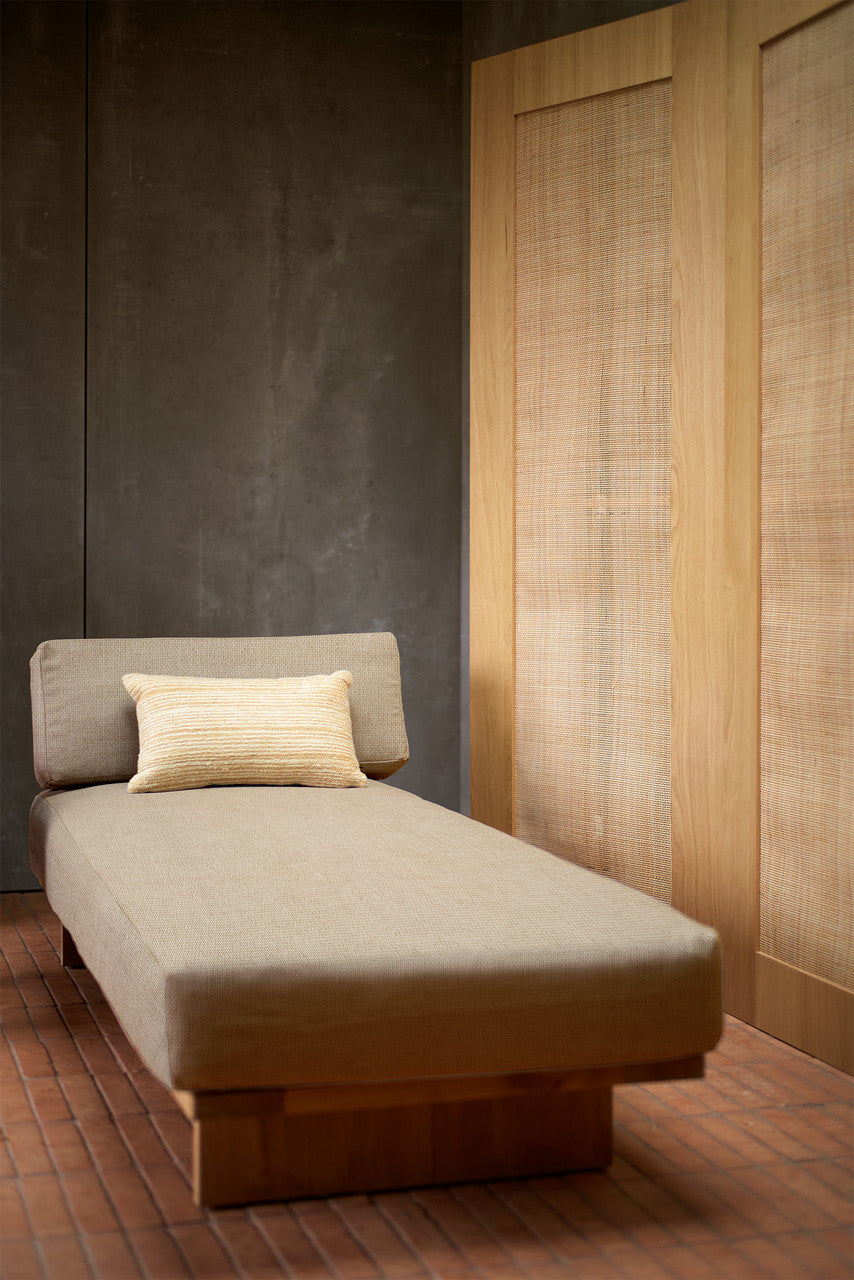 teak wooden day bed with beige cushion