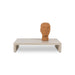  sand colored wooden low plateau table with terracotta head sculpture