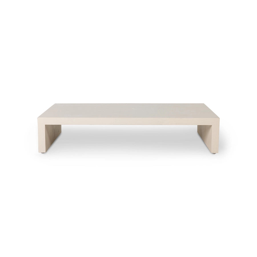 sand colored wooden plateau table 