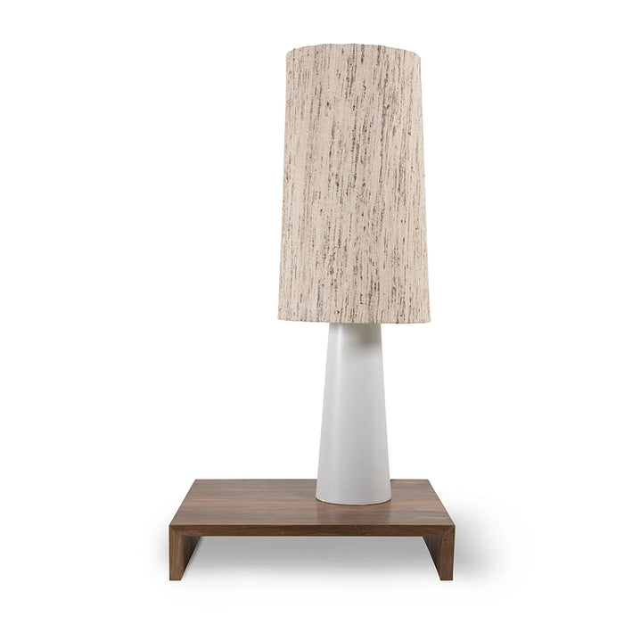 teak wooden plateau table with table lamp for elevation from floor