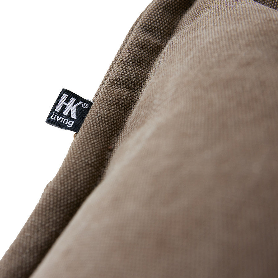 canvas brown cushion detail from arm rest chair