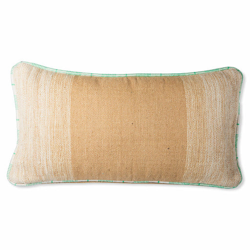 large hand woven wool lumbar pillow in camel and cream with a white and green piping