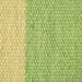 detail of light and darker green handwoven wool 